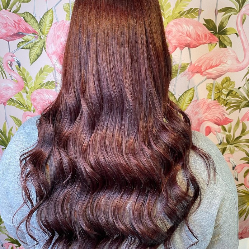 Glossy mahogany red waves