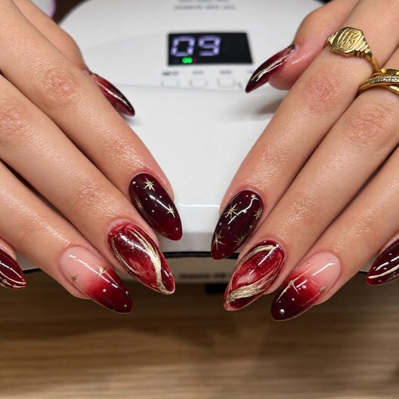Red almond nails with hand-painted art