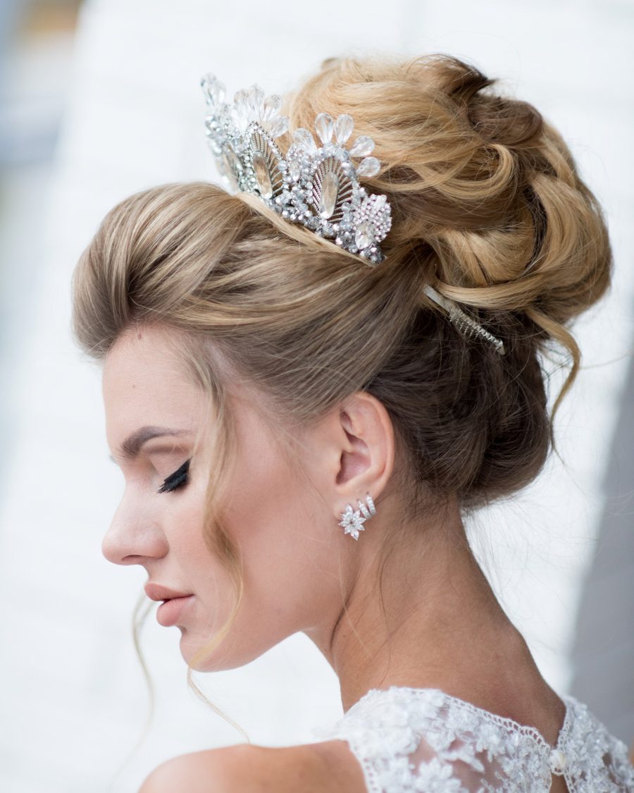 High bridal updo with a crystal tiara