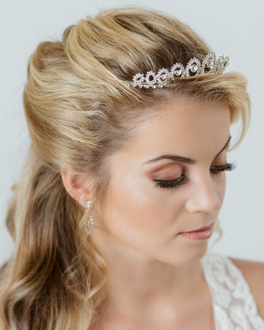 Half-up, half-down bridal hair with a crystal tiara